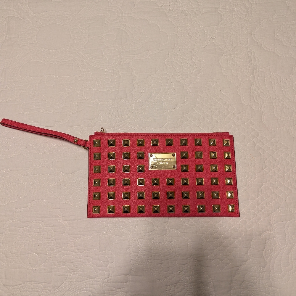 Michael Kors Hamilton Studded Leather  Clutch in hot pink with gold hardware.